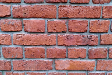 Old red brick wall, restoration of buildings.
