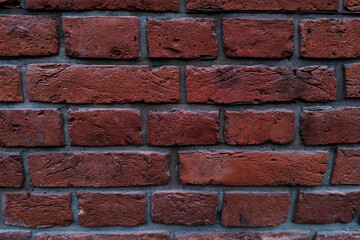 Old red brick wall, restoration of buildings.