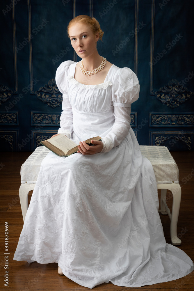 Wall mural A regency woman wearing a white muslin dress 