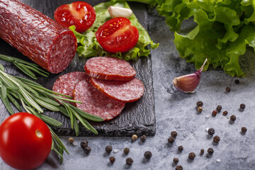 Dry-cured sausage with spices, garlic and herbs  .