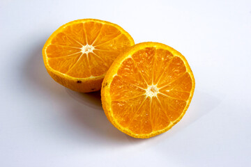 Sliced orange. Orange slices on a white background.