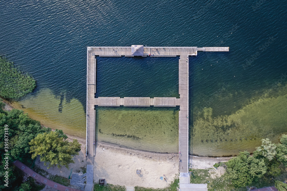 Sticker Drone view of pier on the Narie lake of Ilawa Lake District in Kretowiny, small village in Warmia Mazury region of Poland