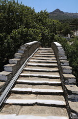 Old Bridge Aladinou. Andros island Cyclades Greece. 