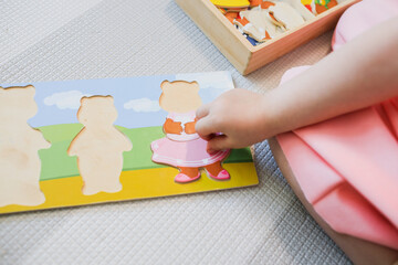 A child plays with educational games. 