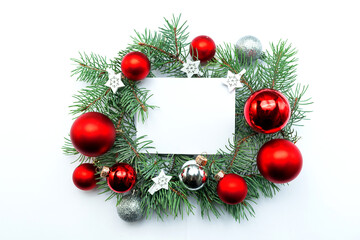 white sheet of paper with a place for text lies on top of the New Year's decor