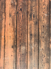 Background of vertical wooden orange planks