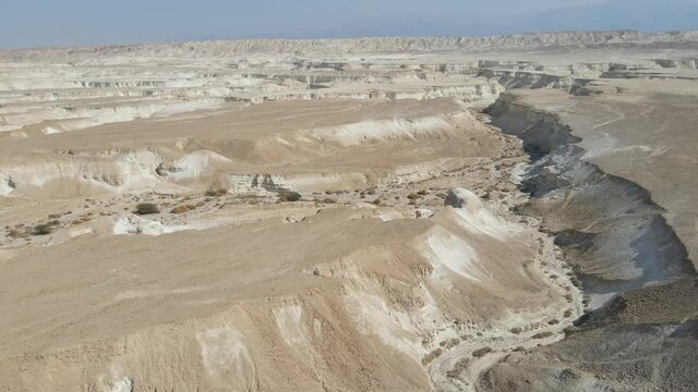 Aerial view of Desert landscape, beautiful canyons, mountains ,sands and vast arid terrain , Judean Desert Israel

