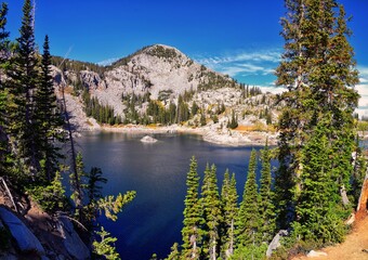 
Lake Mary panorama views from hiking trail to Sunset Peak on the Great Western Trail by Brighton Resort. Rocky Mountains, Wasatch Front, Utah. United States.
