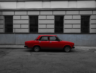 Plakat red car on the street