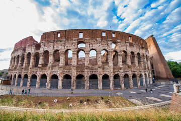 Fototapeta na wymiar ROME, ITALY - JUNE 2014: The Colosseum and the homonymous square on a summer day