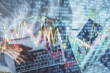 Multi exposure of woman hands working on computer and forex chart hologram drawing. Top View. Financial analysis concept.