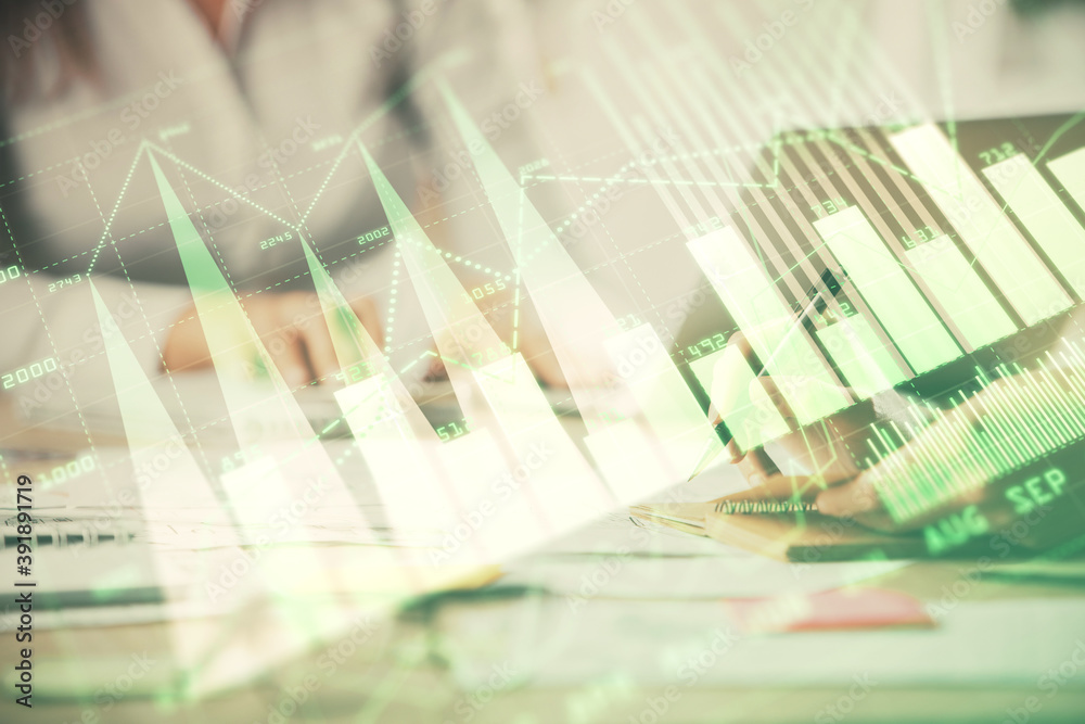 Poster multi exposure of woman hands typing on computer and forex chart hologram drawing. stock market anal