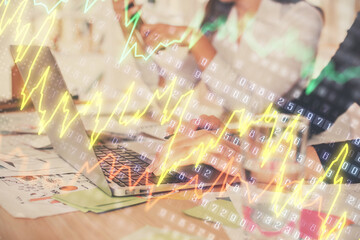 Multi exposure of woman hands typing on computer and forex chart hologram drawing. Stock market analysis concept.