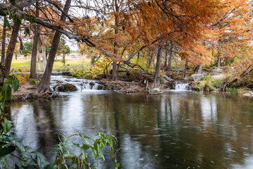 Fototapeta na wymiar Fall colors in the Texas Hill Country on the Guadalupe and Frio rivers including Garner State Park