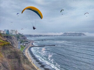 Pacific Ocean - Paragliding - Miraflores, Lima, Peru. One of the most affluent districts that make...