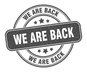 we are back stamp. we are back label. round grunge sign