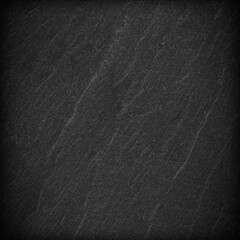 Dark grey black slate background or texture.