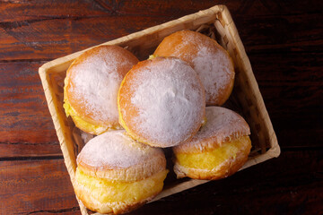 Berlin balls, known as sweet dreams in Brazil. Consists of a fried sweet dough filled with a yellow cream or pastry cream