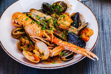 Seafood platter. Langoustine, vongole, shrimps, prawns, clams, mussels, scallop