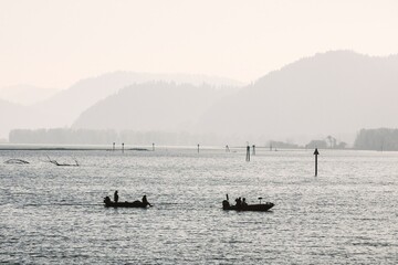 Two fishing boats on a lake in Idaho.