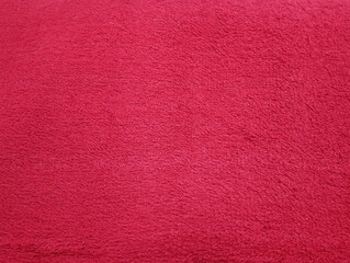 Fototapeta premium Red dye cotton fibrous bath body towel background