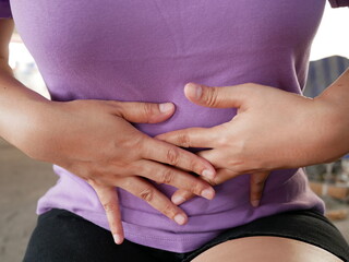 woman having stomachache with menstruation.