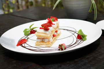 Strawberry Mille Feuille cake in white plate