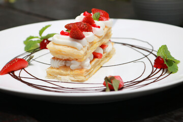 Strawberry Mille Feuille cake in white plate
