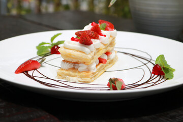Strawberry Mille Feuille cake in white plate