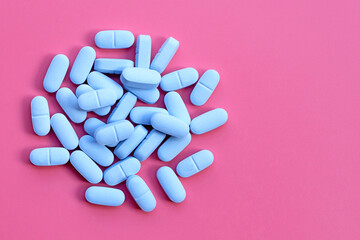 "PrEP" ( Pre-Exposure Prophylaxis). used to prevent HIV on pink background.
