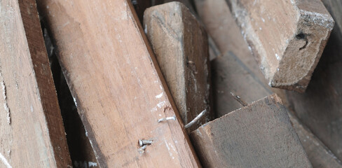 Old wood planks broken and overlapped. Selective focus