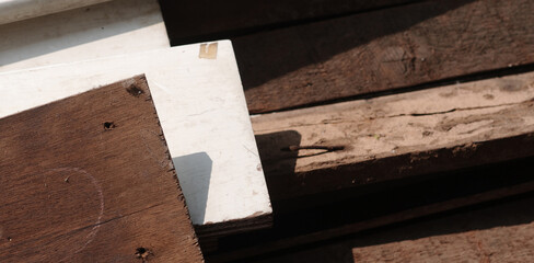 Old wood planks broken and overlapped. Selective focus