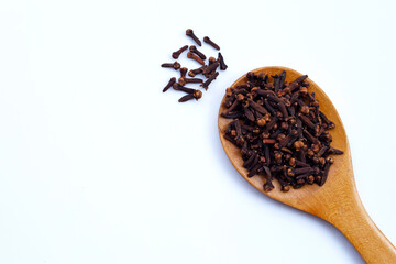 Spice dried cloves on white background.