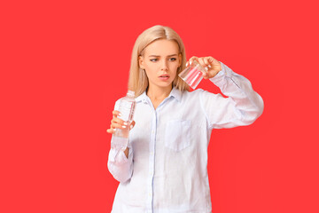 Woman with problem of excessive thirst on color background. Diabetes symptoms