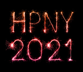 2021 happy new year (HPNY) fireworks written sparklers at night