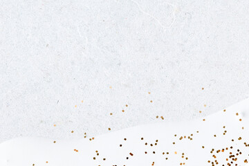 Fototapeta na wymiar Gold glitter on abstract white background
