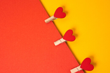 Hearts on a clothespin two-color background Copy Space free space