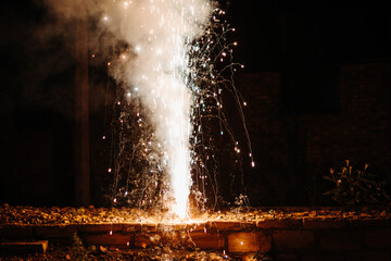 Closeup shot of the flower pot firecracker burning during the Diwali festival in India. Diwali celebration