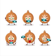 Photographer profession emoticon with christmas ball cookies cartoon character