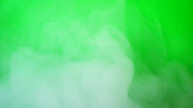 Beautiful billowing smoke against chromakey background