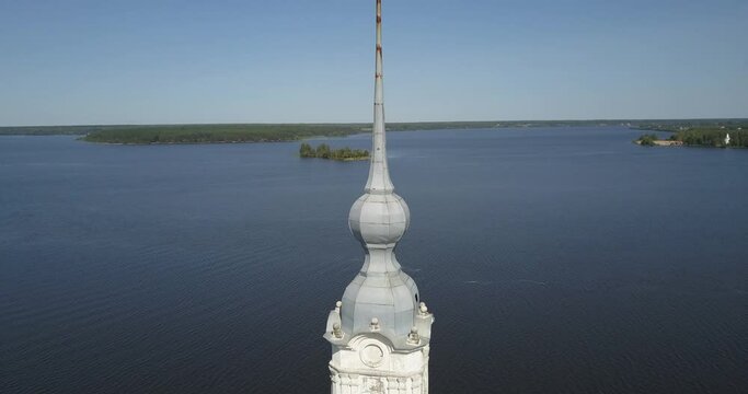 4K high quality aerial video footage of partly submerged Nikolskiy/St. Nicholas Сathedral bell tower off the shore Kalyazin town on great Volga River, Golden Ring route 200 km from Moscow, Russia