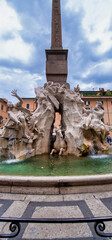 Obraz premium ROME, ITALY - JUNE 2014: Tourists enjoy the beautiful square of Piazza Navona in summer season