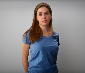 Obraz premium Young woman in blue casual clothes.