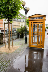 Telephone booth on the street in Karlovy Vary