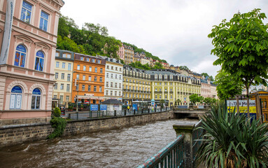 Naklejka premium River and embankment in the center of Karlovy Vary in Czech Republic
