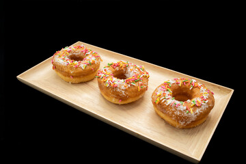 Sugar donuts with multi color sprinkles
