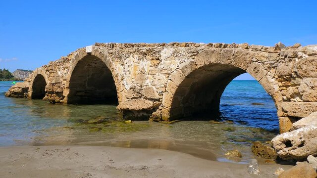 Old Venetian Bridge Argassi on Greek Beach