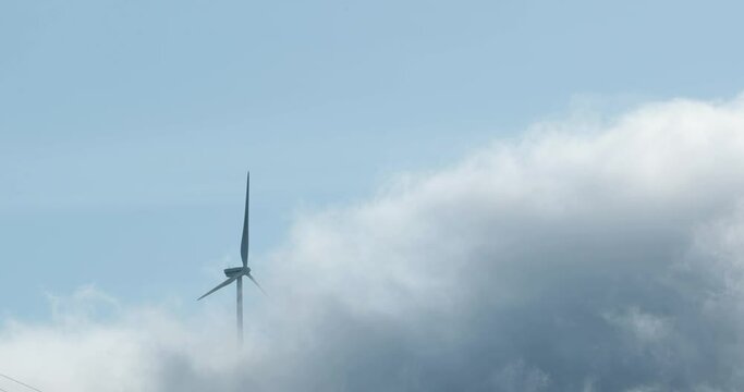 Clouds over a windmill in Leiria, Portugal -slow motion