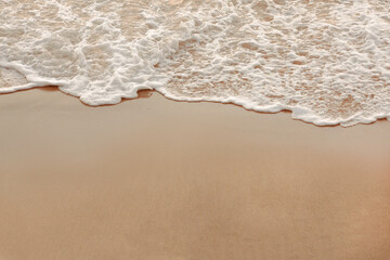 Fototapeta na wymiar Sea waves on sandy beach panorama landscape background