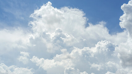 Beautiful sky with white clouds pattern background. Sky and clouds in daylight. Natural abstract background.